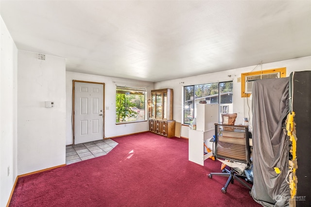 interior space featuring carpet floors and a wall mounted AC