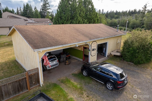 9346 Nels Nelson Rd NW, Bremerton, WA 98311 - view of vehicle parking featuring fence and a detached garage