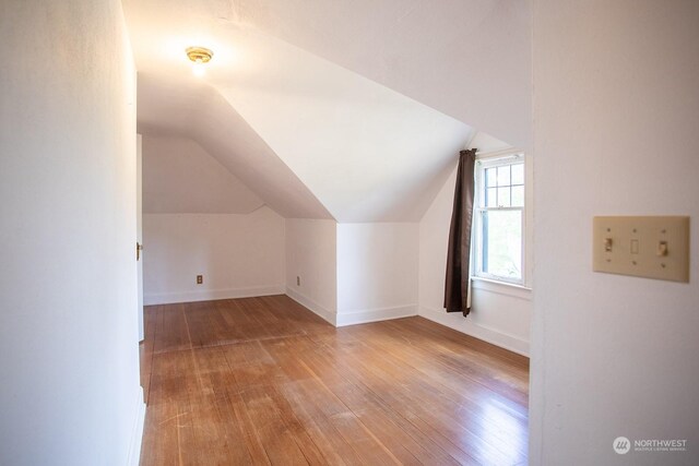 9346 Nels Nelson Rd NW, Bremerton, WA 98311 - bonus room with light wood-type flooring, lofted ceiling, and baseboards