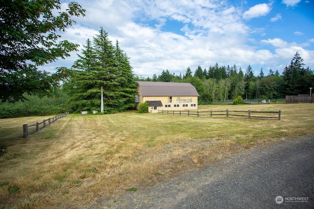 9346 Nels Nelson Rd NW, Bremerton, WA 98311 - view of yard with an outbuilding, a view of countryside, and a pole building