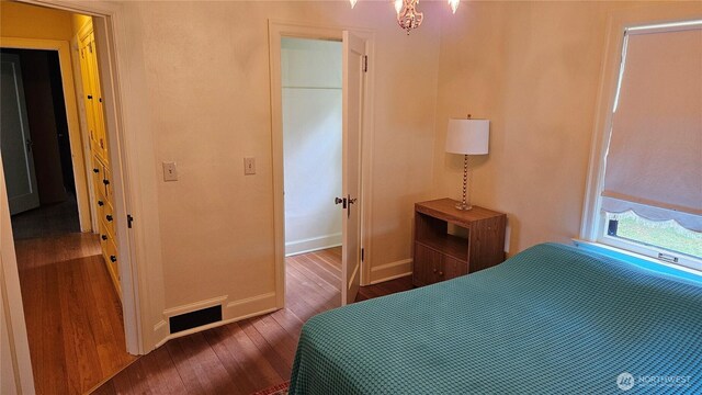 9346 Nels Nelson Rd NW, Bremerton, WA 98311 - bedroom with wood finished floors and baseboards