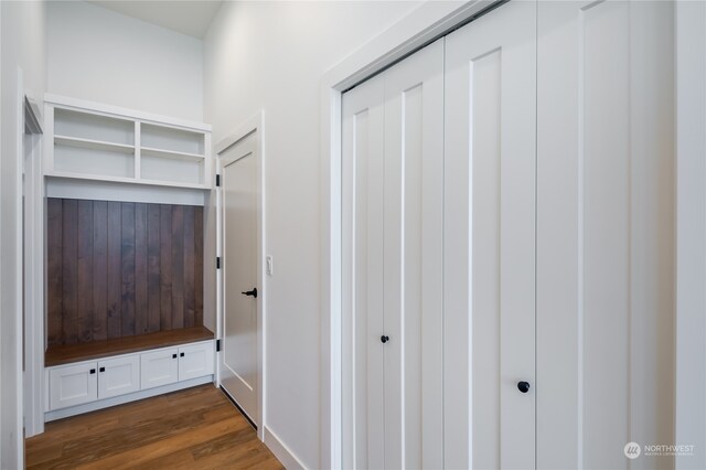 mudroom with dark hardwood / wood-style floors