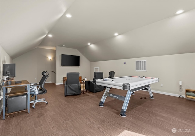 recreation room featuring hardwood / wood-style floors and vaulted ceiling