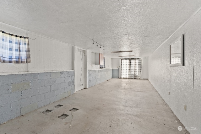 interior space with a textured ceiling