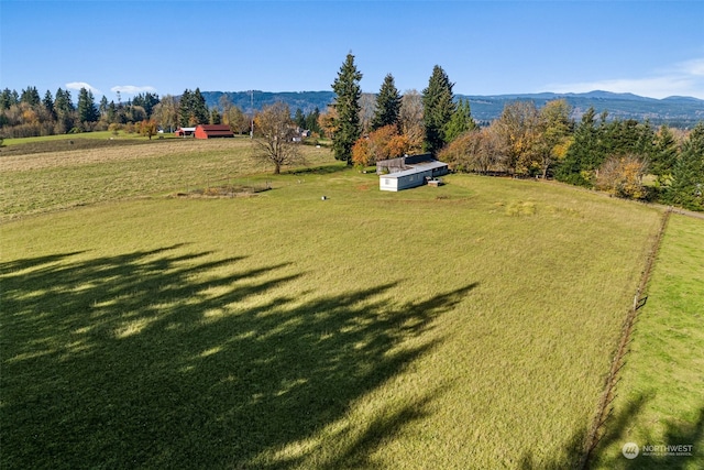 aerial view featuring a mountain view and a rural view