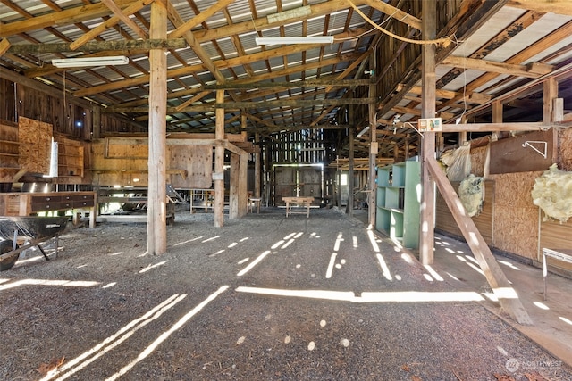 misc room with lofted ceiling