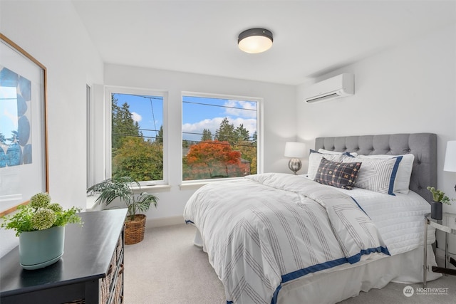 carpeted bedroom with an AC wall unit