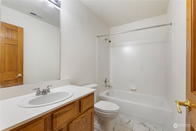 full bathroom featuring vanity, bathing tub / shower combination, and toilet