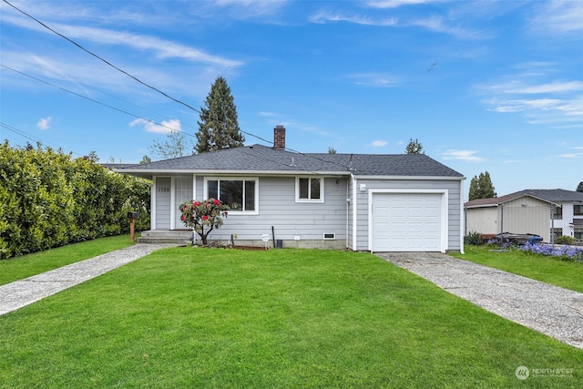 single story home featuring a garage and a front lawn