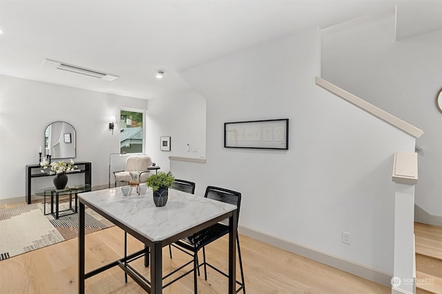 dining area featuring light hardwood / wood-style floors