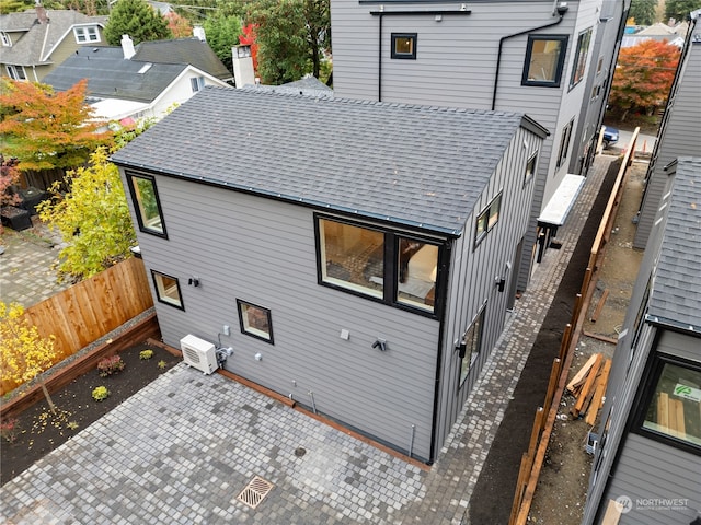 back of property with a patio area