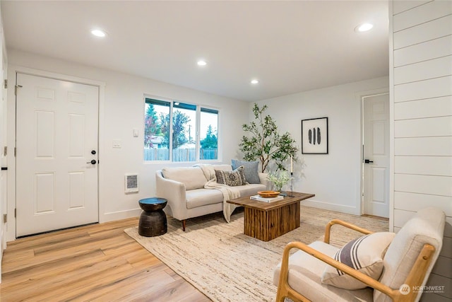 living room with light hardwood / wood-style floors