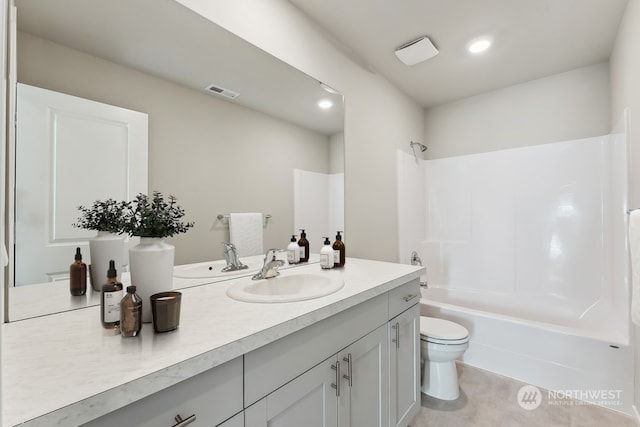 bathroom featuring tile patterned flooring, visible vents, tub / shower combination, toilet, and vanity