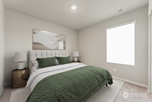 bedroom featuring visible vents, carpet flooring, and baseboards