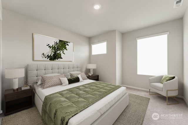 bedroom with visible vents, baseboards, and carpet