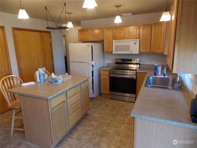 kitchen with pendant lighting, sink, white appliances, a kitchen island, and light brown cabinetry