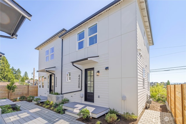 rear view of house with a patio