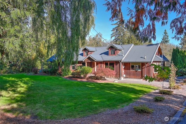 ranch-style home featuring a front yard and a porch