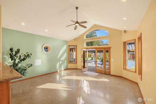 interior space featuring a ceiling fan, baseboards, recessed lighting, and finished concrete floors