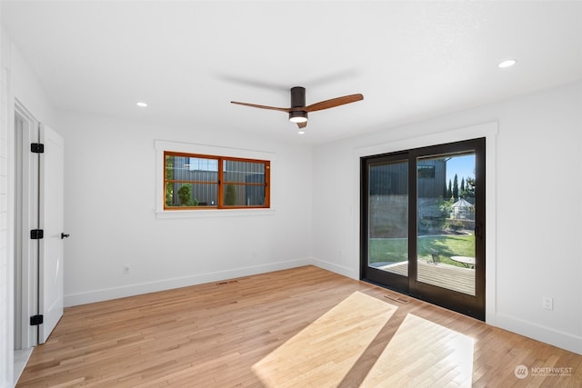 unfurnished room with light hardwood / wood-style flooring and ceiling fan