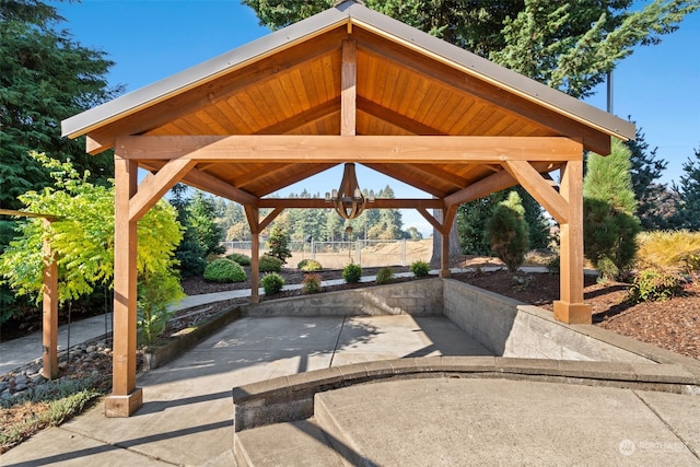 view of property's community featuring a gazebo and a patio area