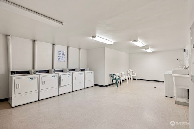 interior space with washing machine and clothes dryer