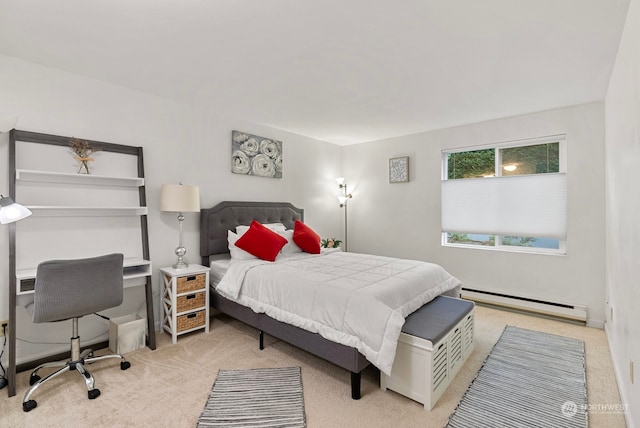 bedroom featuring baseboard heating and light colored carpet