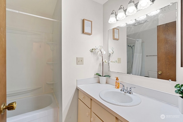 full bathroom featuring vanity, toilet, and shower / bath combo with shower curtain