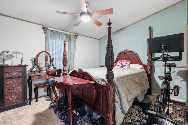 bedroom featuring crown molding, carpet, and ceiling fan