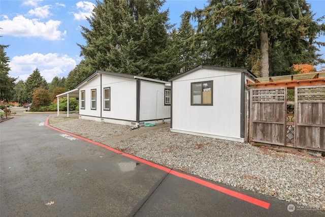 5250 College St SE Unit 18, Lacey, WA 98503 - view of outbuilding featuring fence