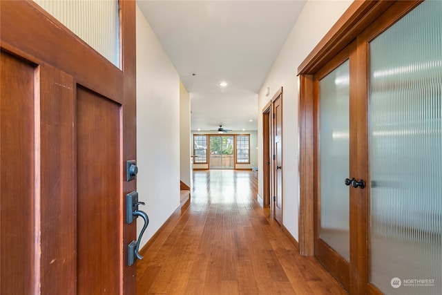 hall featuring light hardwood / wood-style floors