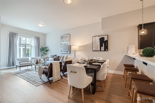 dining room featuring light hardwood / wood-style floors