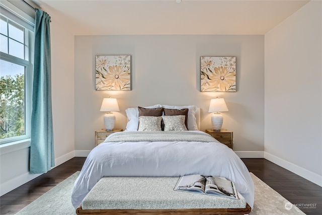 bedroom featuring dark hardwood / wood-style floors