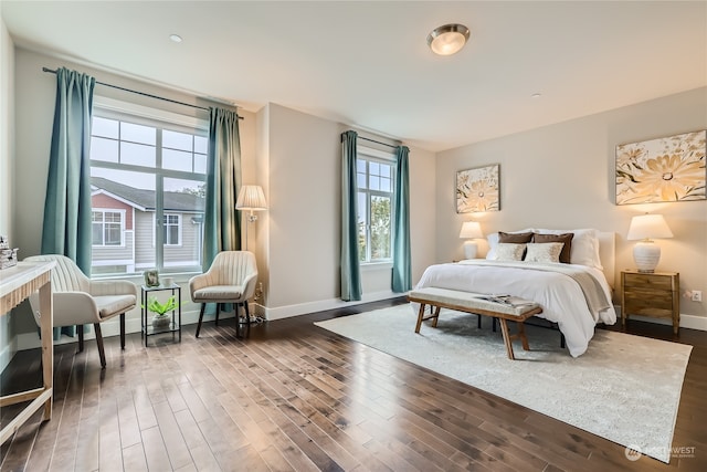 bedroom featuring dark wood-type flooring