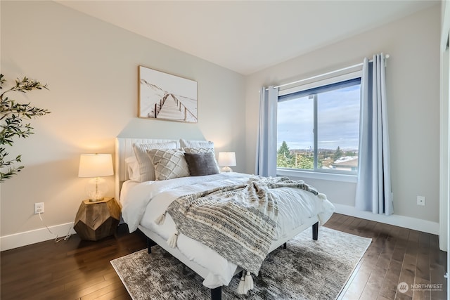 bedroom featuring dark hardwood / wood-style floors