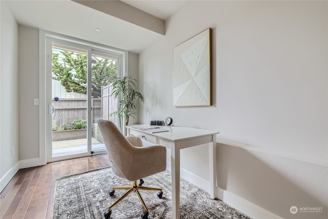 office with hardwood / wood-style floors