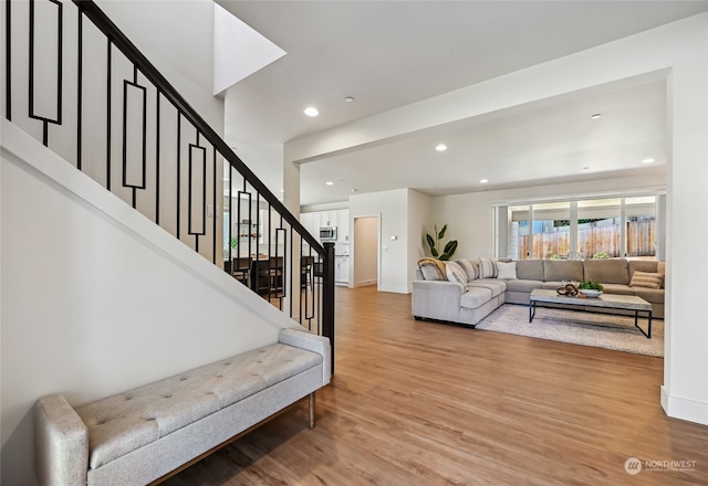 living room with light hardwood / wood-style flooring