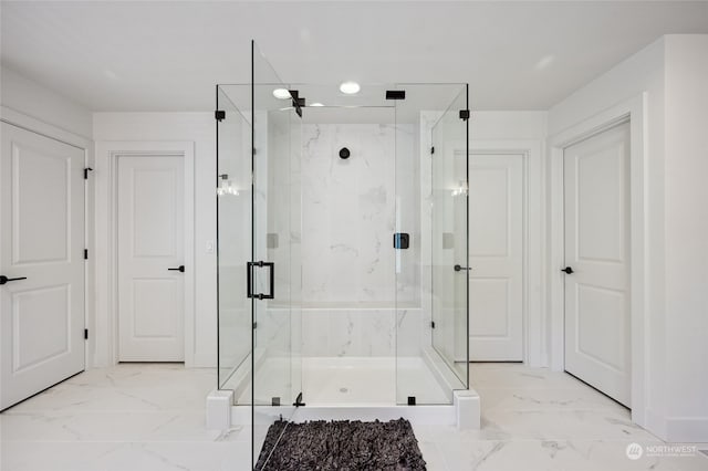 bathroom featuring an enclosed shower