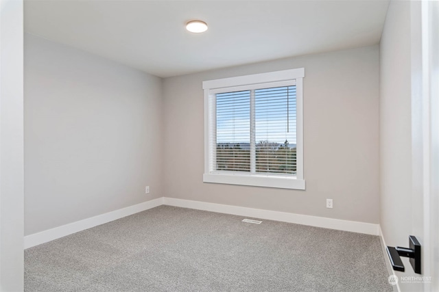 empty room with carpet floors