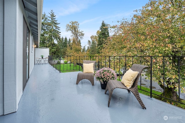 view of patio / terrace with a balcony