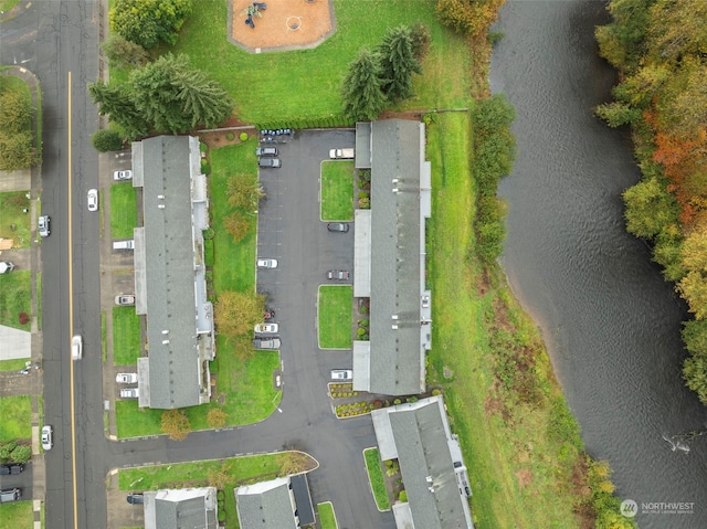 drone / aerial view with a water view