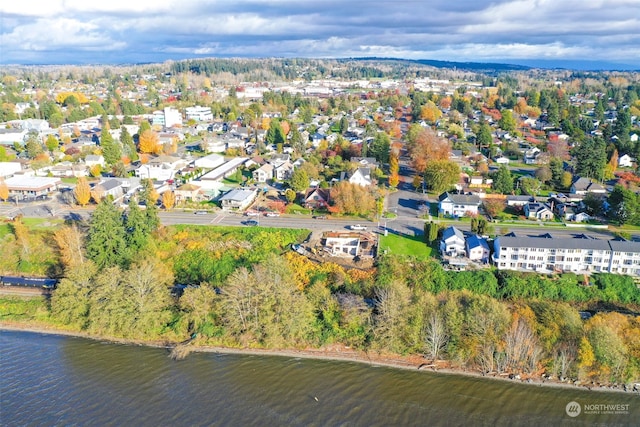 drone / aerial view with a water view