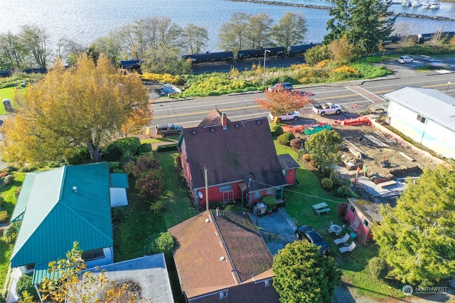 drone / aerial view with a water view