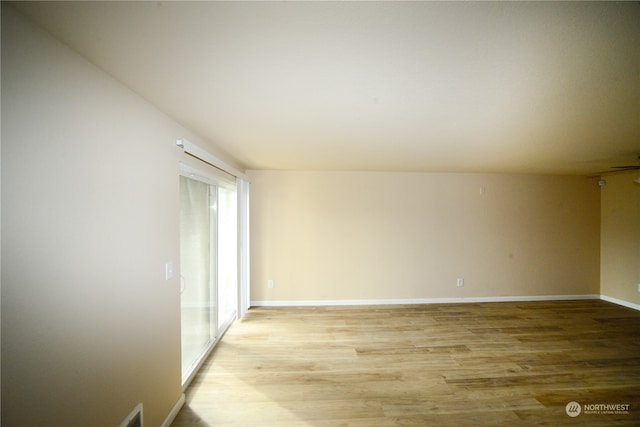 spare room featuring light hardwood / wood-style flooring