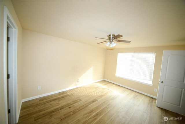 unfurnished bedroom featuring ceiling fan and light hardwood / wood-style floors