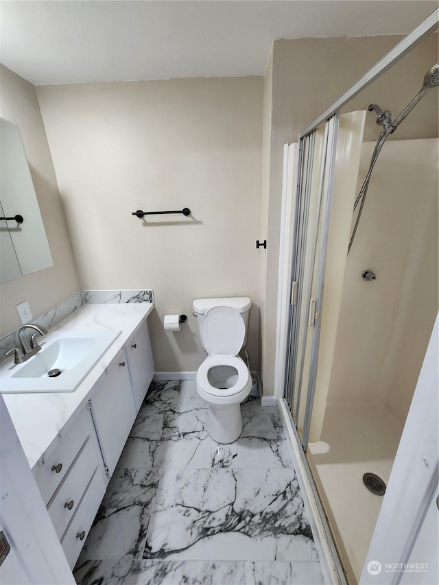 1111 Archwood Dr SW Unit 447, Olympia, WA 98502 - bathroom with vanity, toilet, a shower stall, and marble finish floor