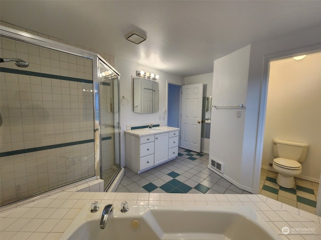 full bathroom with toilet, tile patterned flooring, vanity, and separate shower and tub