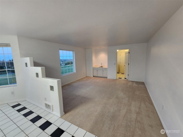 151 Rilla Ln, Sequim, WA 98382 - empty room featuring baseboards and light carpet