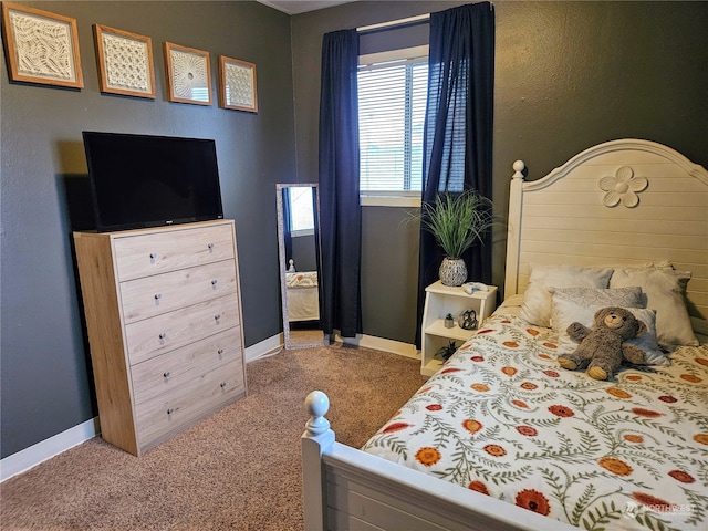 bedroom featuring carpet