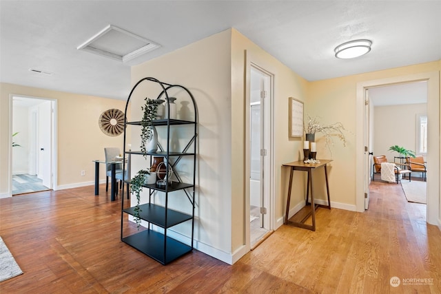 hall featuring light wood-type flooring